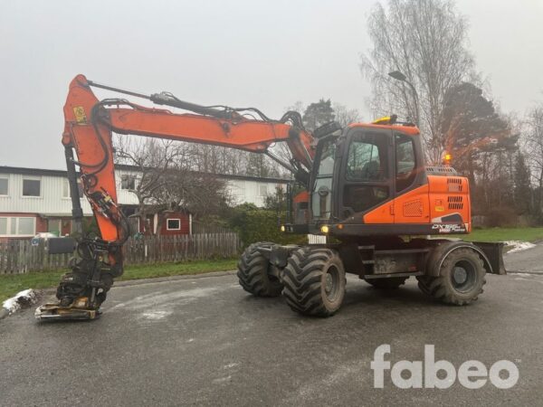 Doosan DX 165W-5 Hjulgrävare med redskap