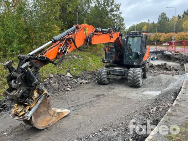Doosan DX 165W-5 Hjulgrävare med redskap