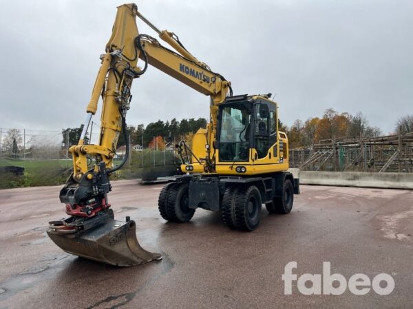 Fabeo - Hem 50 Komatsu PW 148 -10 Hjulgrävare med Rototilt